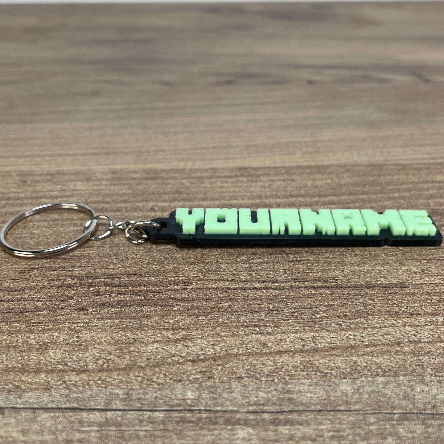 glow in the dark minecraft keychain black background