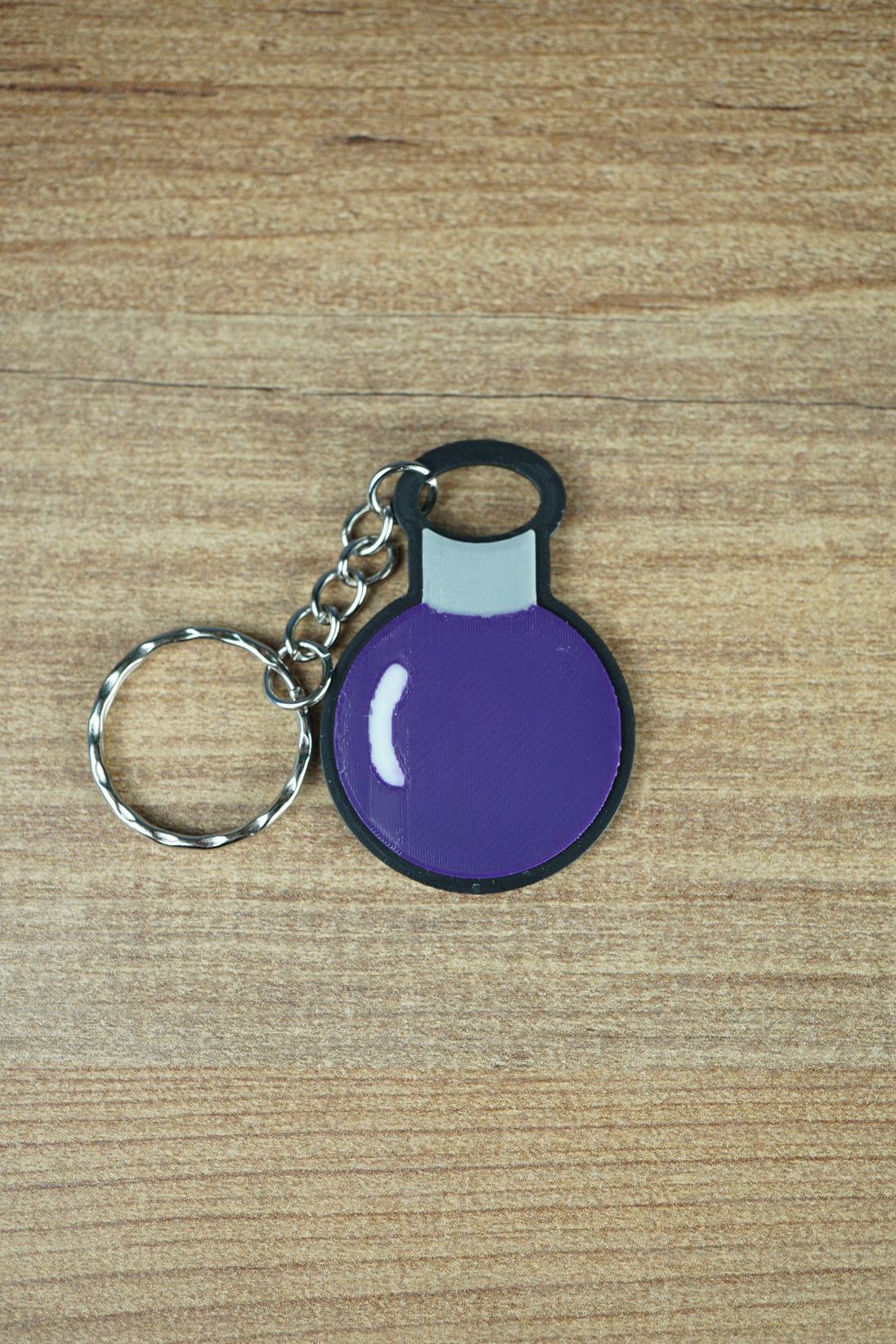 Factorio promethium science keyring dark purple design