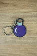 Factorio promethium science keyring dark purple design