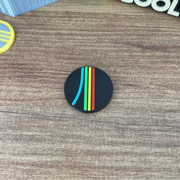 Arc Raiders logo magnet with multicolor line detailing