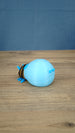Rear view of the blue glow lantern bug plush showing its rounded blue body and small tail details.