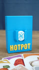 Blue 3D printed Palia Hotpot storage case with gold Hotpot lettering, displayed with ingredient cards in front.