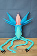 Full Collector Leviathan Subnautica fan figure on wooden surface showing 44cm length, articulated limbs, claws, and opening head