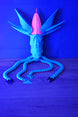 Collector Leviathan Subnautica fan figure with articulated tentacles, blue body, pink head crest, and glow markings under UV light