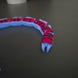 Crabsnake Articulated Toy with Glow-in-the-Dark Blue Accents
