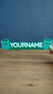 Front view of personalized Palia Cyl-inspired name sign with two cute green cylinder characters, designed as a custom gamer desk decoration