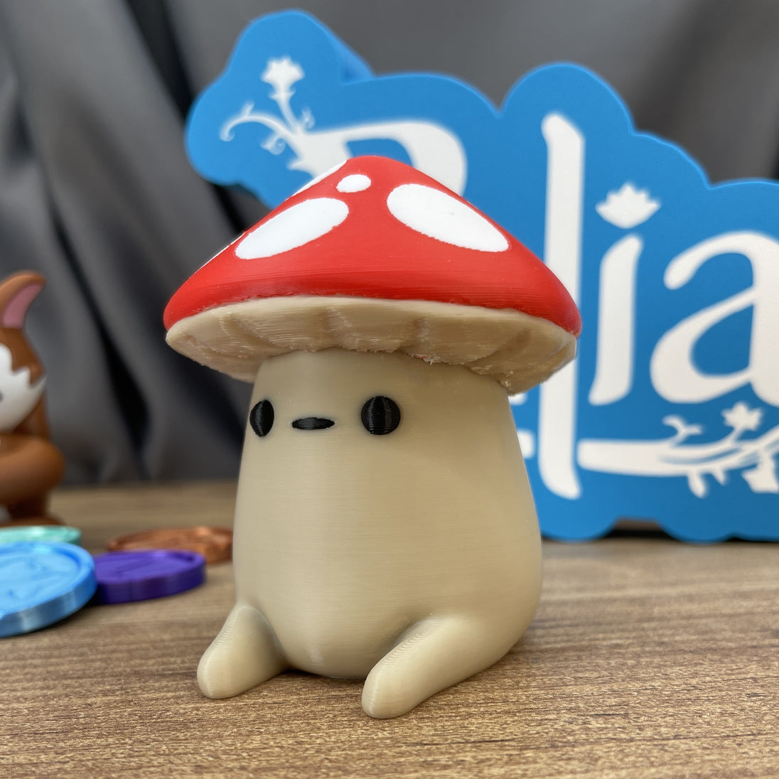 small fantasy mushroom creature desk decor