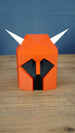 Front view of a red Dragon Med Helm OSRS replica with black face detail and white horns, made as RuneScape fan display decor