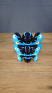 Front view of 8cm and 12cm Duskwing Butterfly collectible figures arranged together to show the two available size options.
