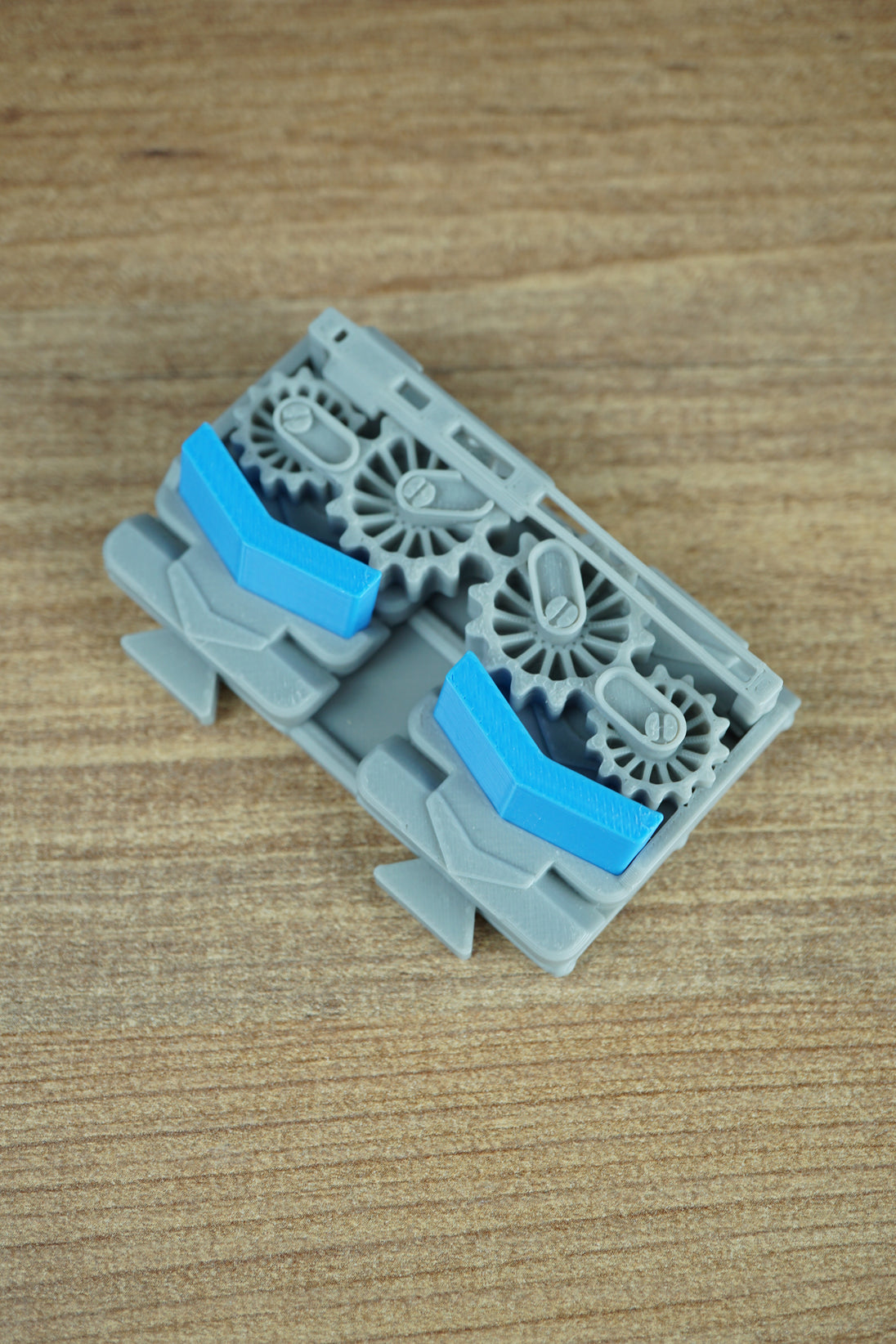 Close-up of Factorio blue belt splitter component