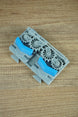 Close-up of Factorio blue belt splitter component