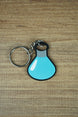 Factorio chemical science flat keyring light blue design