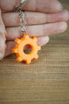 Front view of Factorio orange gear cog collectible