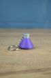 Factorio production science pack keyring purple flask