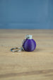 Factorio promethium science pack keyring dark purple flask