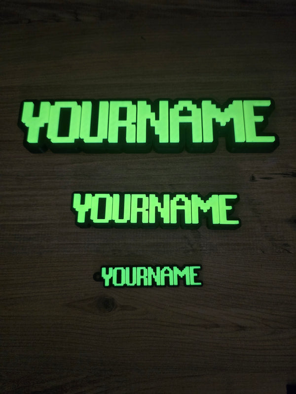 Collection of Glow In the Dark Nameplates and Keyring 