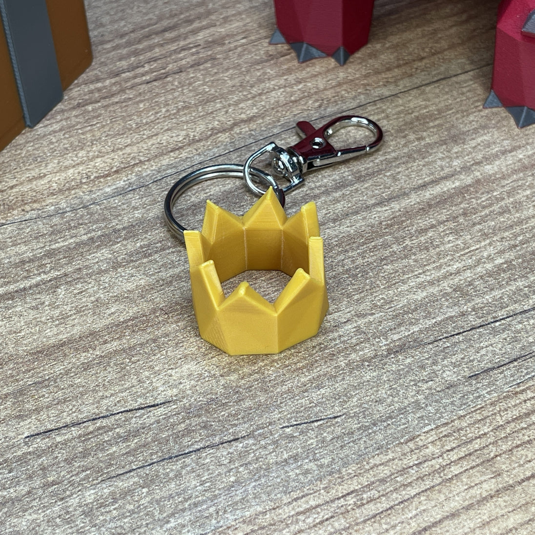 Gold RuneScape party hat collectible keychain