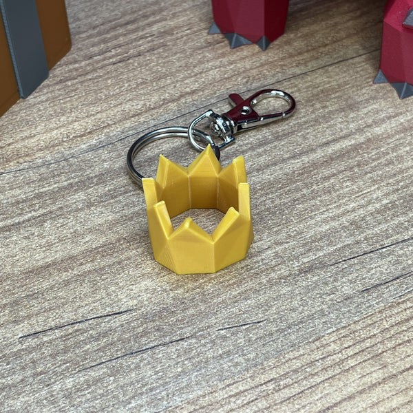 Gold RuneScape party hat collectible keychain