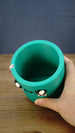 Top view of the green Cyl pen holder showing its spacious open interior, rounded rim and practical storage capacity for pens, pencils and craft tools.