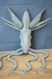 Grey Collector Leviathan Subnautica fan figure with articulated tentacles, sharp claw tips, raised head fins, and detailed creature body on display.