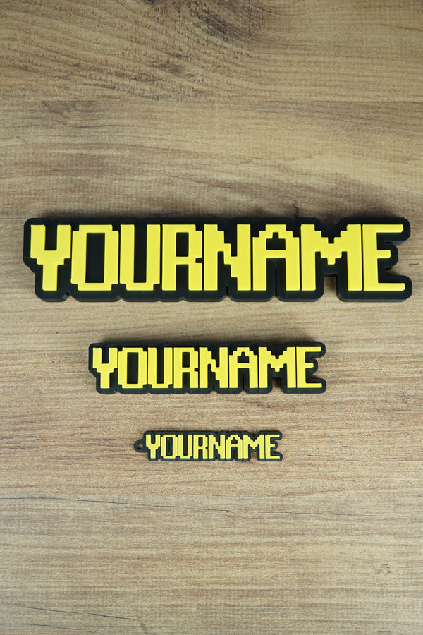 Photo of Group Collection of Font Text Nameplates and Keyring