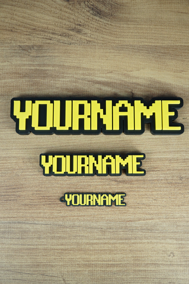 Photo of Group Collection of Font Text Nameplates and Keyring