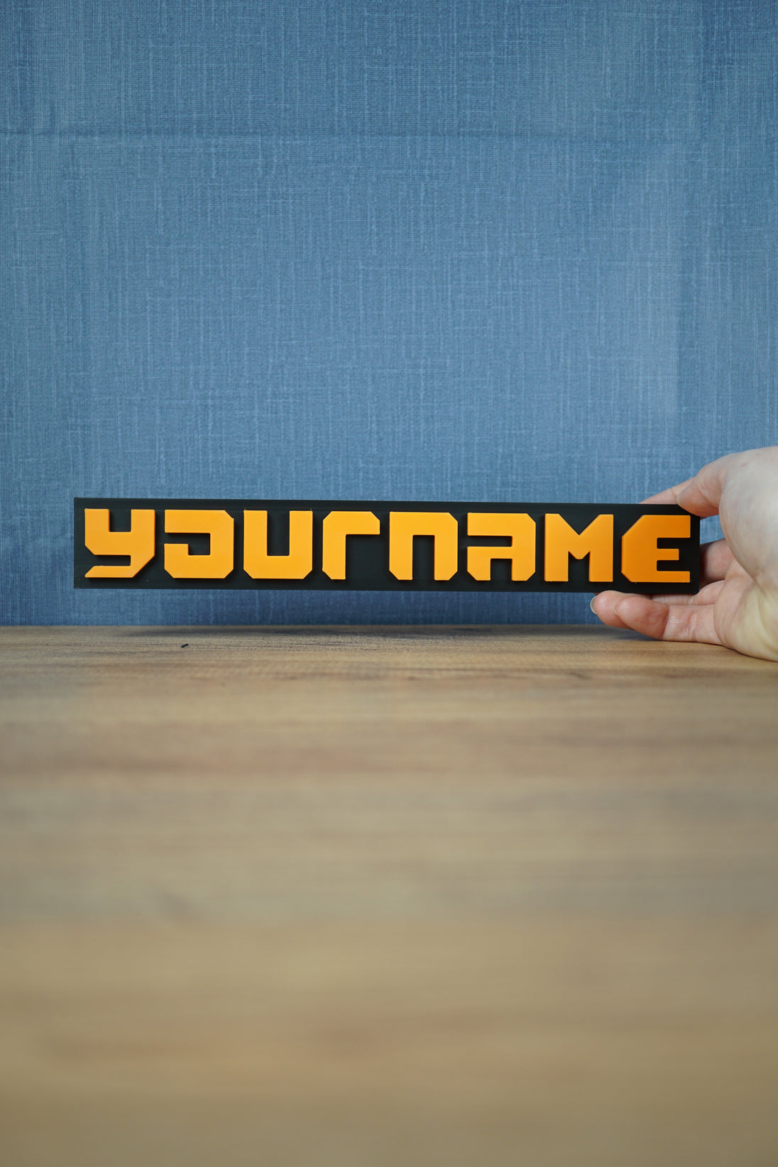 hand scale to show the size and lenght of nameplate