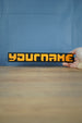 hand scale to show the size and lenght of nameplate
