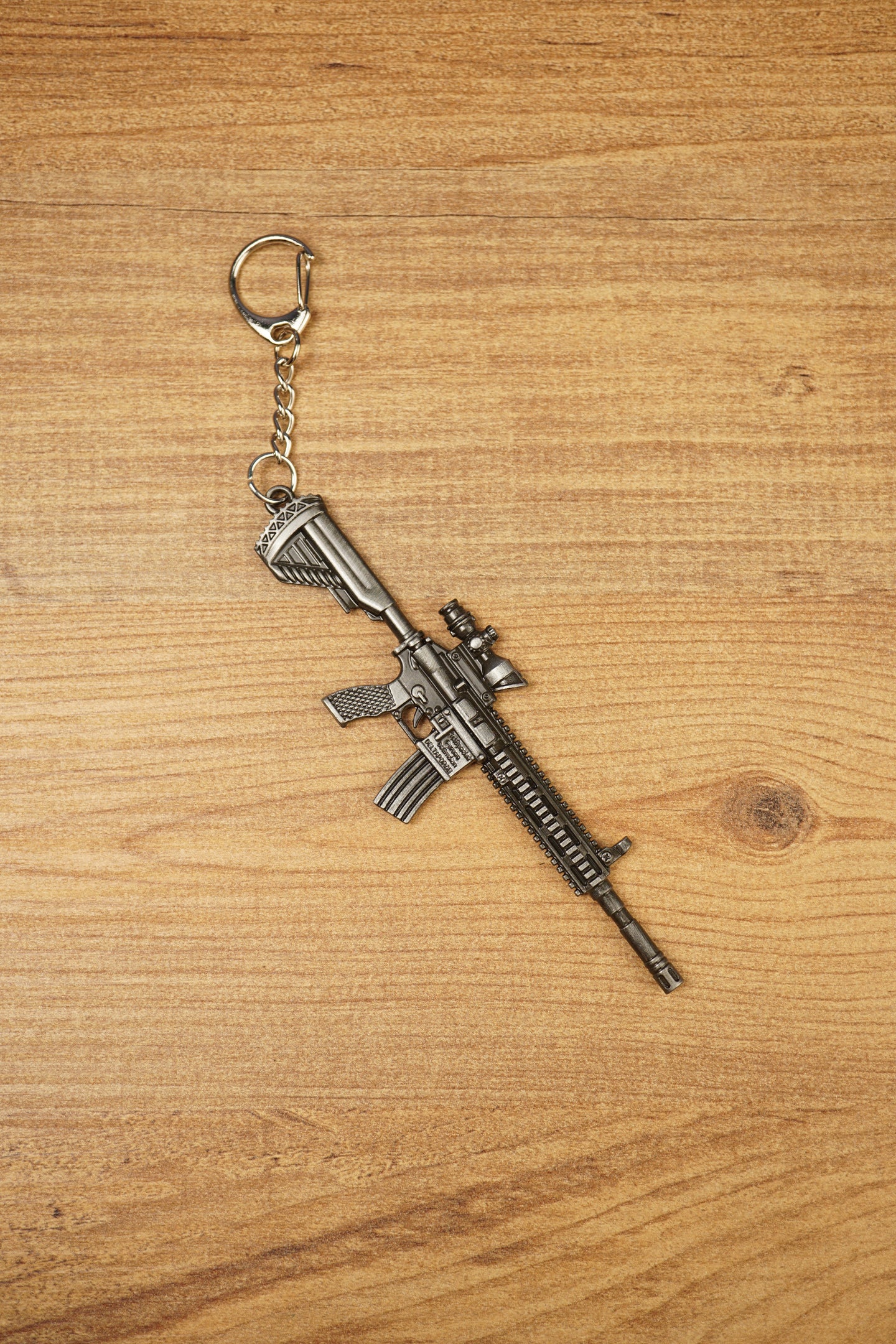 HK 416A5 tactical rifle keyring replica displayed diagonally with metal chain, compact gaming gift design and matte black finish