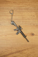 HK 416A5 tactical rifle keyring replica displayed diagonally with metal chain, compact gaming gift design and matte black finish