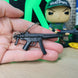 HK MP5 9x19 Submachine Gun Keychain Replica on Backpack