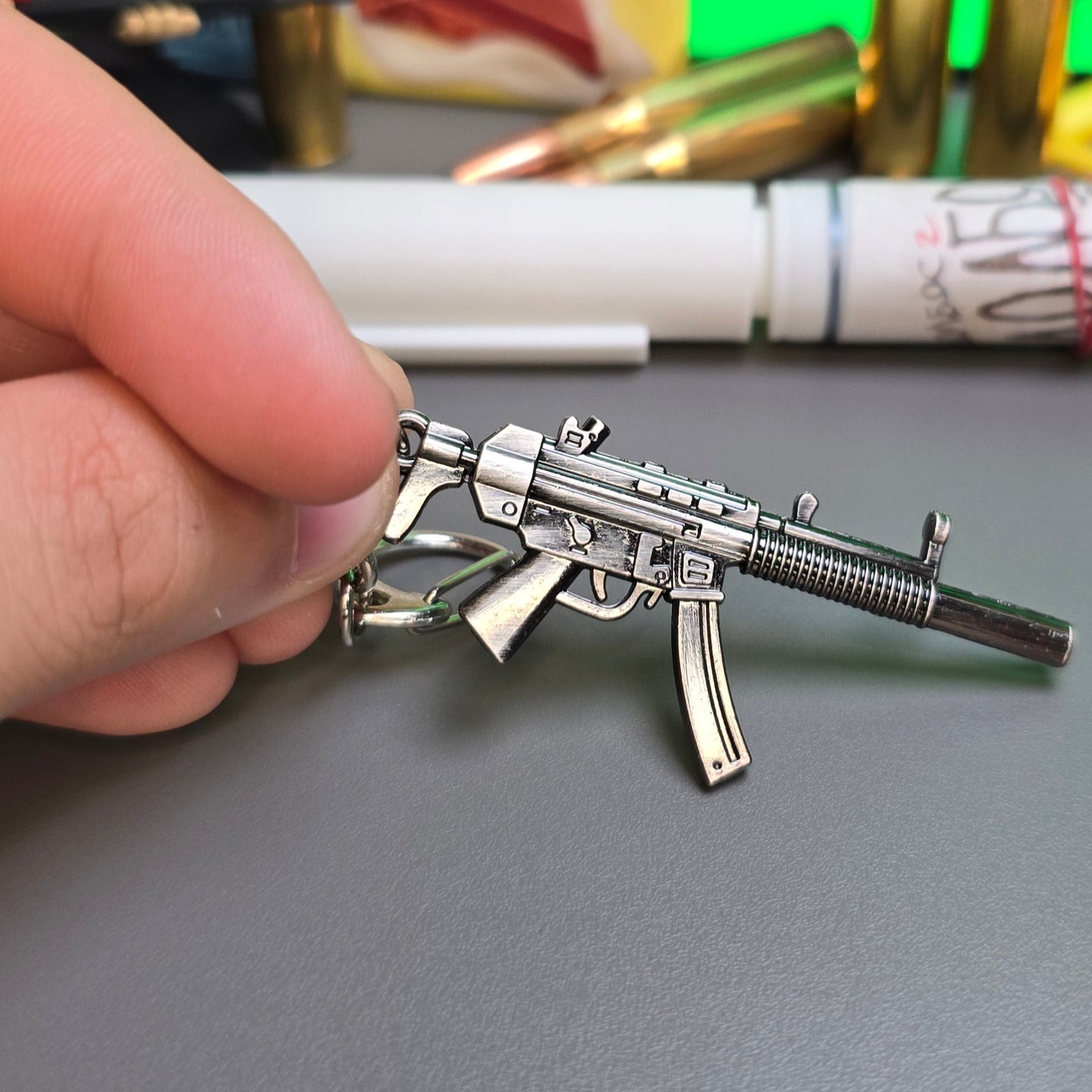 HK MP5 9x19 Silenced Submachine Gun Keychain Replica In Hand