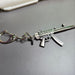 HK MP5 9x19 Silenced Submachine Gun Keychain Replica Side View