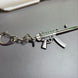 HK MP5 9x19 Silenced Submachine Gun Keychain Replica Side View