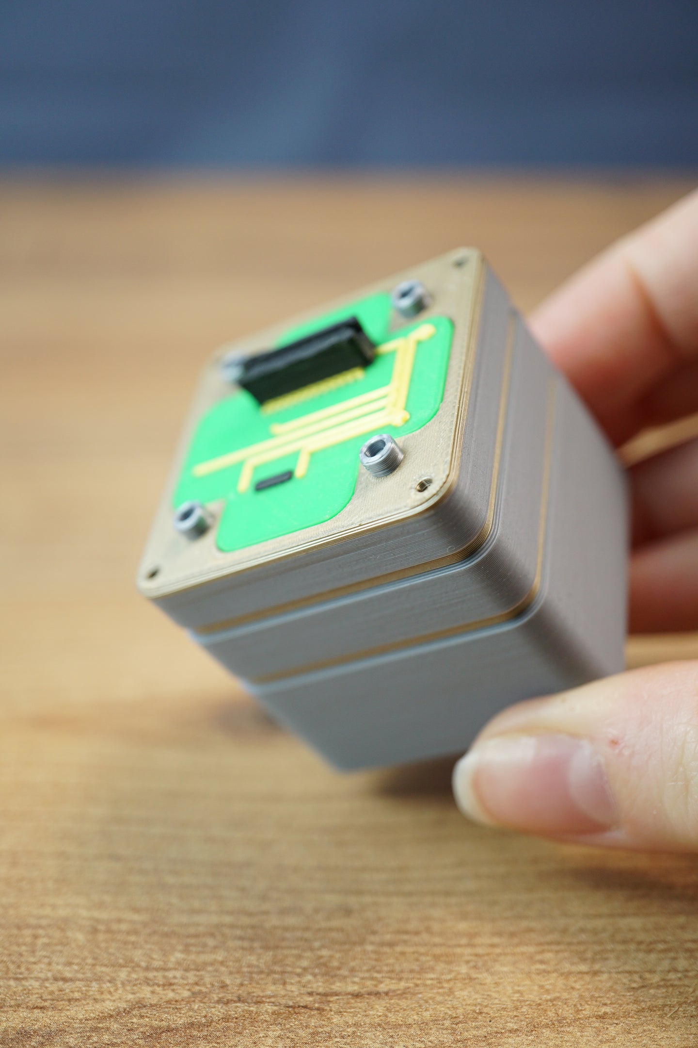 Handheld Iridium thermal vision module replica inspired by Tarkov, showing detailed green circuit board top, grey layered body, and black connector.