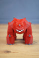 Low poly 3D printed fantasy creature displayed on wooden table