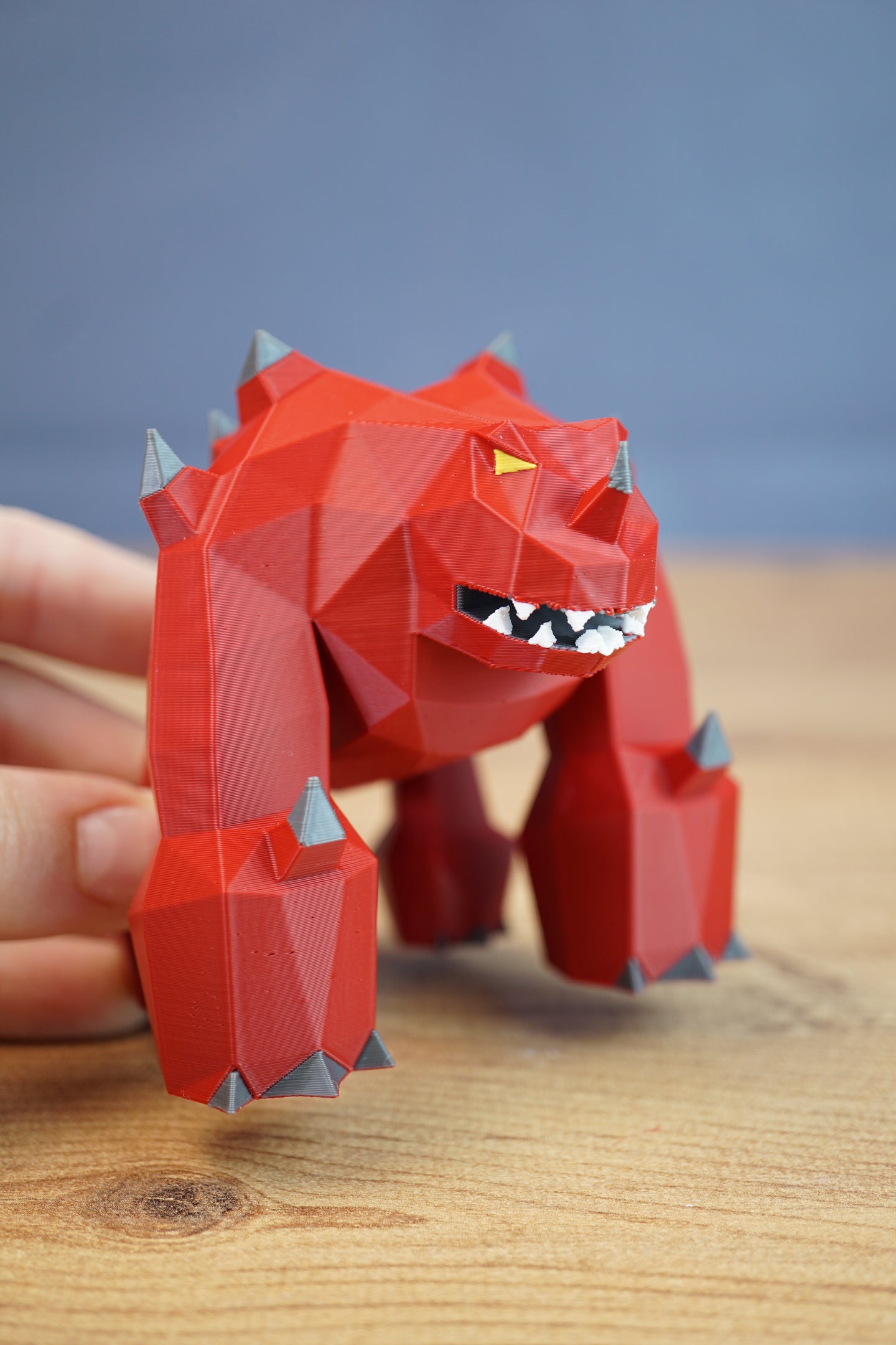red monster inspired by Jad from RuneScape game