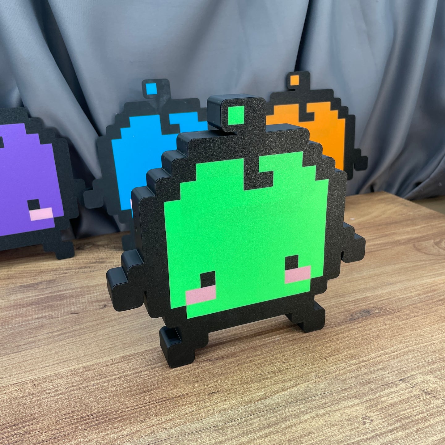 Handmade Junimo light box glowing in dark room