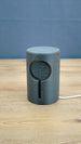 Front view of the No Man’s Sky inspired Knowledge Stone lamp showing the circular alien symbol design, dark grey housing and USB power cable.