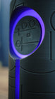 Close-up of the Knowledge Stone LED light glowing purple, showing the illuminated circular ring, alien markings and detailed sci-fi casing.