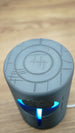 Top angled view of the Knowledge Stone gaming lamp with blue LED illumination and detailed circular sci-fi pattern across the top surface.