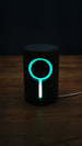 No Man’s Sky inspired Knowledge Stone lamp glowing bright cyan in a dark room, highlighting the circular RGB ring and vertical light strip.