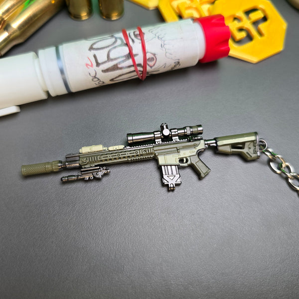 Miniature SR-25 sniper rifle in tan, black, and brown

