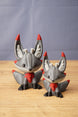 Obsidian Kitsuu figures in large and small sizes with grey bodies, red accents, black paws and cute fox-like faces
