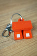 OSRS Dragon Boots keychain inspired by iconic melee gear