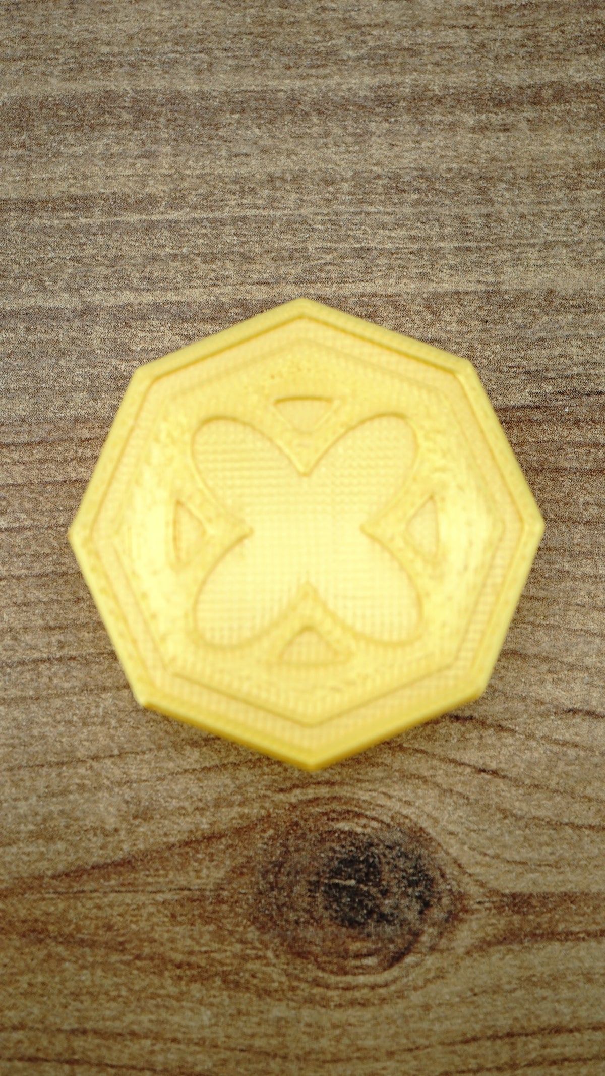 RuneScape inspired gold coin collectible measuring approximately 4cm across, shown for scale with its bright silk gold finish and detailed design