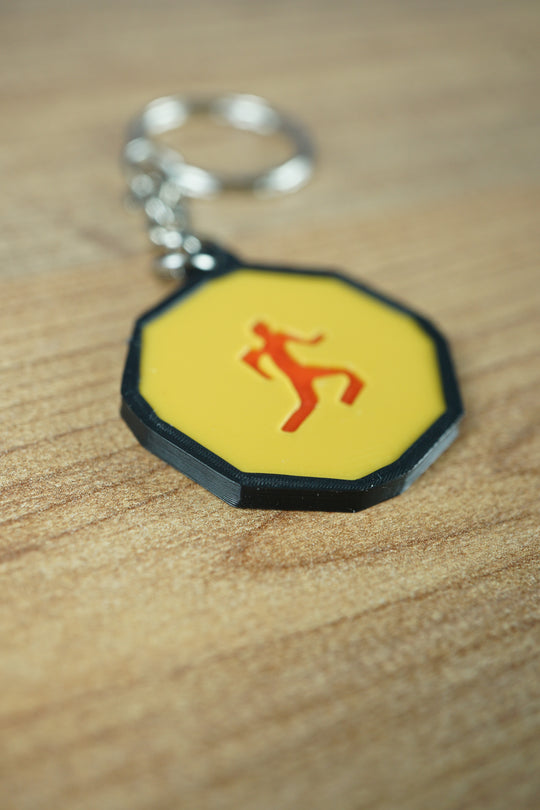 OSRS Mark of Grace keychain inspired by agility course rewards