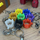 Full set of RuneScape party hat keyrings in 8 colors