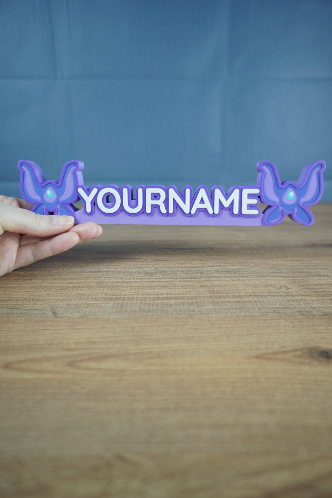 Custom celestial nameplate 3D printed for cozy gamer desk setup