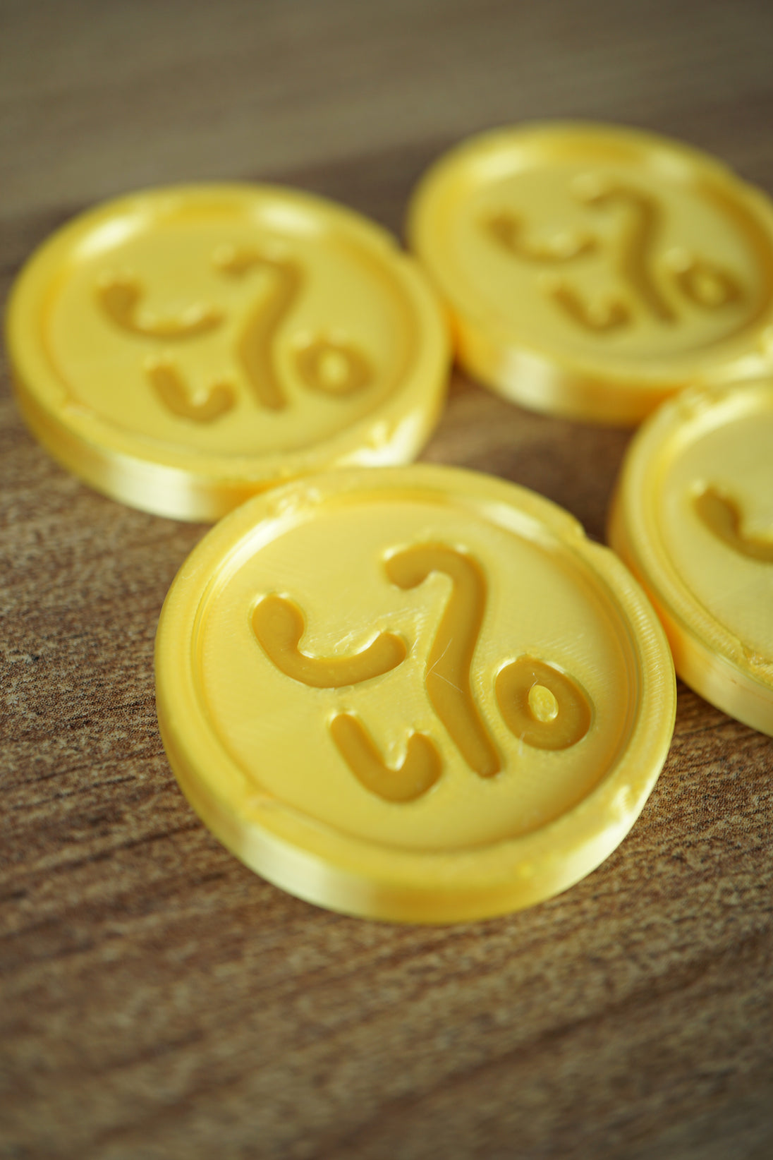 3D printed Palia coin close-up gold color